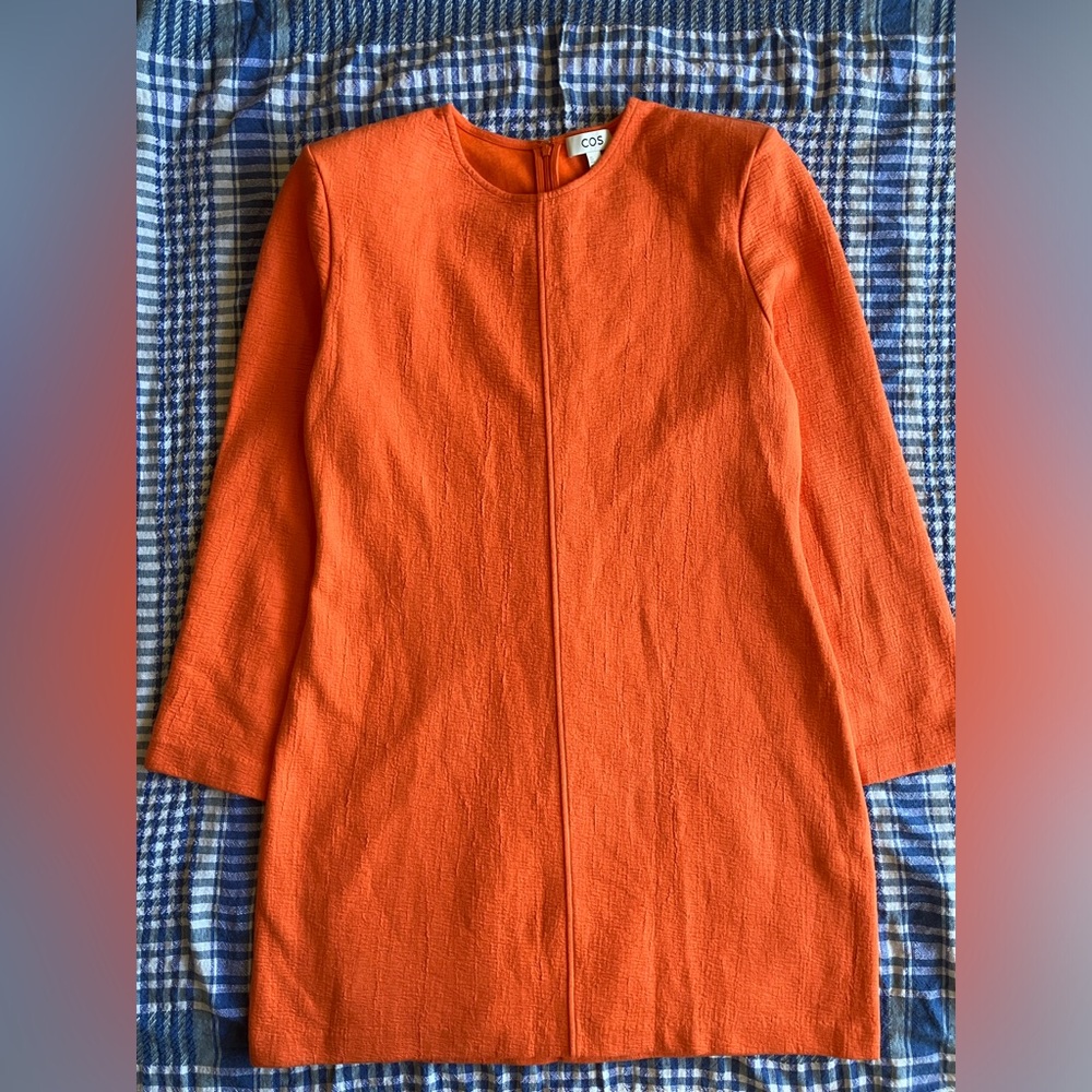 COS size large dress in orange. Modest shoulder pads and a zipper in back.